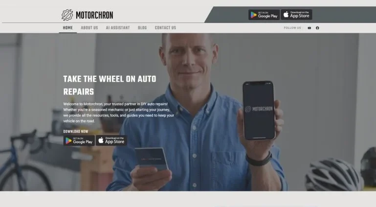 The Motorchron home page: a mechanic holding a phone, the headline "Take the wheel on auto repairs", and Google Play and App Store badges.